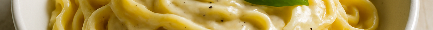 Pâtes crémeuses aux saucisses et aux champignons