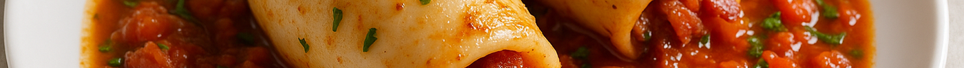 Calamars farcis au bacon et sauce tomate aux herbes