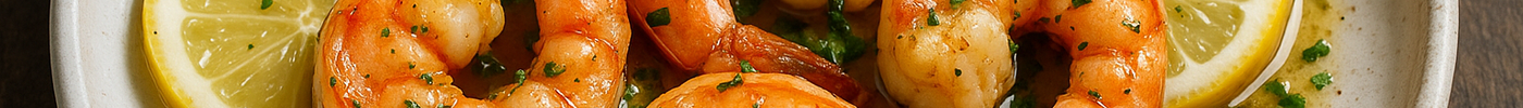 Poêlée de crevettes au beurre à l'ail et au citron