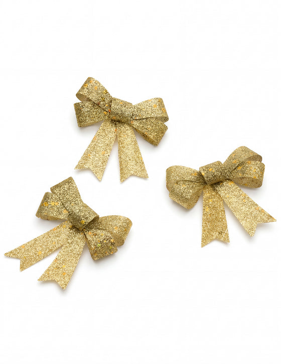 3 N?uds à paillettes dorés 10 x 13 cm