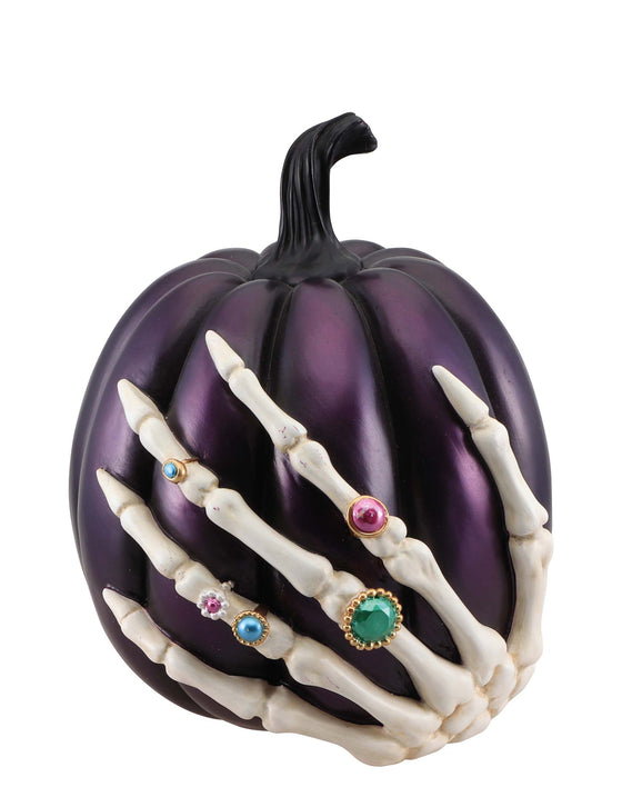 Citrouille violette avec main squelette en résine 27cm