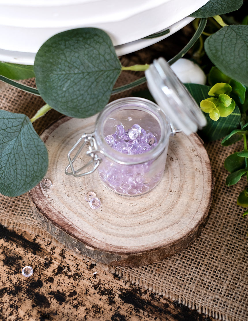 Perles effet goutte de pluie parme 50 g pour décoration de table